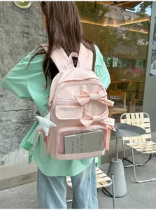 Mochila rosa bonita con lazo para mujer, bolso casual grande con bolsillo delantero transparente.