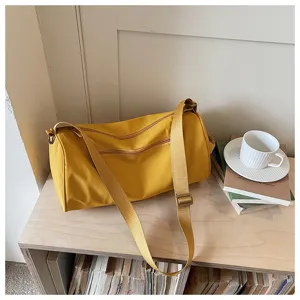 Sac bandoulière cylindrique en nylon décontracté pour femme, grande capacité quotidien.