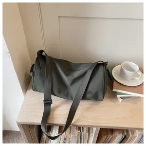 Sac bandouliere cylindrique en nylon minimaliste pour femme, sac de voyage decontracte