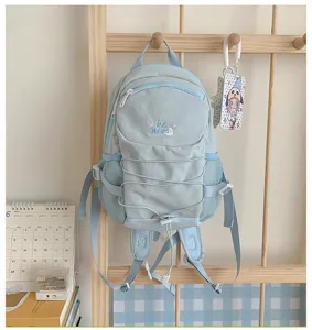 Casual light blue drawstring backpack with multi pockets for school daily travel use.