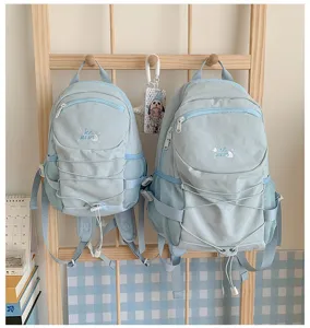 Light blue drawstring backpack casual large capacity school bag for daily use and travel