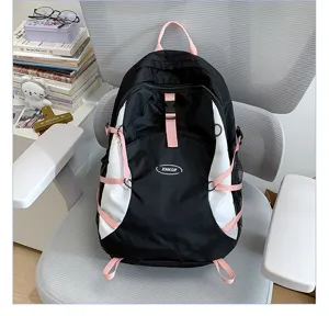Stylish black and white backpack with pink straps, large capacity casual daypack for daily use.