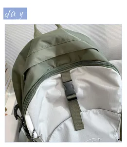 Waterproof colorblock backpack outdoor travel hiking daypack with durable buckle and zipper.