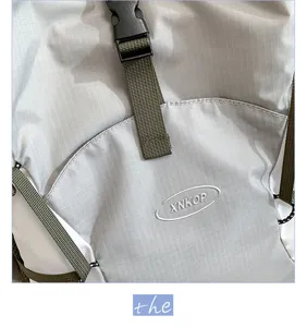 Detail view of lightweight folding outdoor mountaineering backpack, waterproof ripstop fabric.