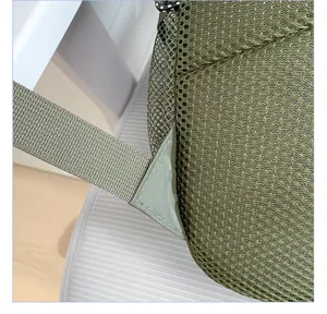 Detailed view of lightweight hiking backpack, breathable mesh fabric, reinforced strap design.