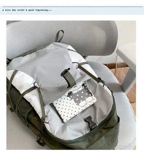 Detailed view of the waterproof outdoor hiking backpack with multi straps and color block design.