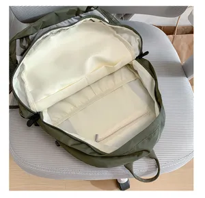 Detailed view of the large capacity waterproof hiking backpack interior structure and pockets.