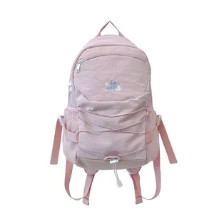 Pink casual backpack with drawstring and large capacity, stylish school bag for women girls.