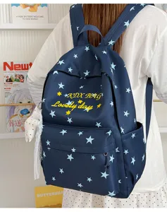 Casual grote capaciteit donkerblauwe rugzak met sterrenprint voor school, dagelijks gebruik en reizen.