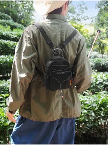 Mini mochila de nailon ligera para viajes al aire libre, elegante mochila informal negra con cordón.