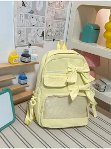 Mochila ita amarillo claro de doble hombro con lazos y bolsillo transparente para estudiantes y diario