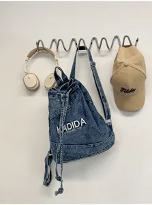 Vintage washed denim backpack, distressed indie design large capacity casual school bookbag.