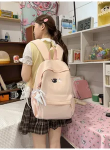 Roze studentenrugzak met schattige kattenborduurwerk, ideaal voor school en dagelijks gebruik.