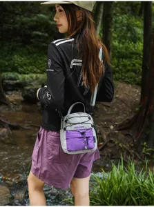 Bolso bandolera de cordón de nailon ligero viaje exterior deporte casual gris claro.