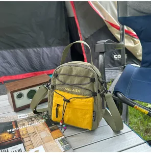 Bolso cruzado informal de nylon para exteriores con cordón, bolso de viaje ligero para uso diario.