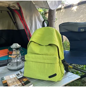 Sac à dos macaron vert grand capacité minimaliste décontracté pour voyage et loisirs.