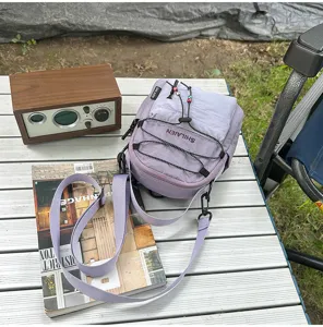 Bolso cruzado de nailon morado claro para viajes al aire libre y funda casual de teléfono.