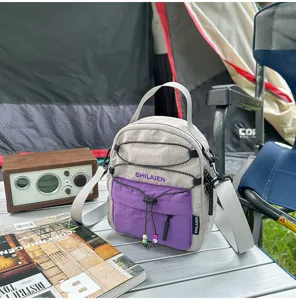 Bolso cruzado de nailon compacto con cordón, bolsa ligera para teléfono móvil para aire.