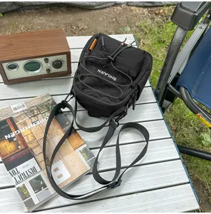 Bolso cruzado ligero de nylon con cordón para viajes al aire libre y uso informal