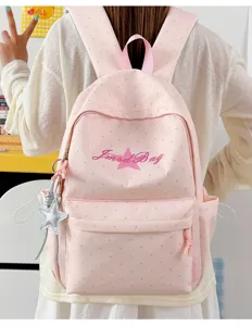 Roze stippen rugzak voor dames, schattige Japanse schooltas met sterhangertje erbij.
