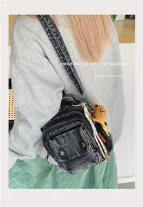 Casual denim shoulder bag for women, stylish crossbody messenger bag with cute bear pendant.