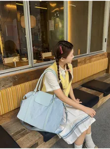 Gran capacidad bolsa de viaje duffel para mujer, bolso de hombro informal ligero azul.