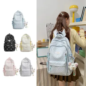 Schattige kawaii polkadot rugzak voor dames en studenten met harige hanger en meerdere zakken.