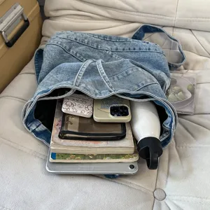 Vintage washed denim backpack, large capacity casual school bag for daily student commuting.