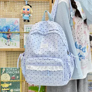 Lichtblauwe rugzak met polkadots en kanten rand, casual Koreaanse stijl voor school en dagelijks.