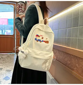 Minimalist canvas school backpack for women, large capacity lightweight campus daily bag.