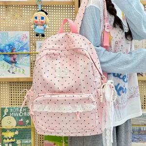 Schattige Koreaanse roze rugzak met stipjes en kanten afwerking, casual schooltas.