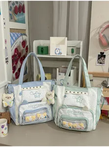Grote canvas ita tas met doorzichtig venster, schattige kattenoren en pluche berenhanger.