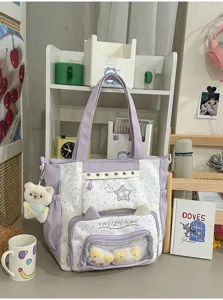 Schattige paarse canvas tas met doorzichtige voorzak, sterrenpatroon en leuke berenhanger.
