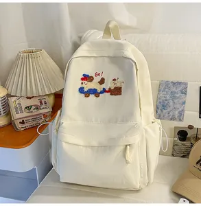 Minimalist canvas backpack for women school casual daypack with cute embroidery design.