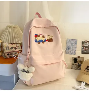 Pink school backpack for women with cute embroidery, large capacity casual daily daypack for students.
