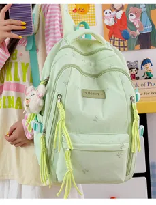 Leuke groene schoolrugzak voor meisjes, grote studententas met prachtige strik borduursel en hanger.