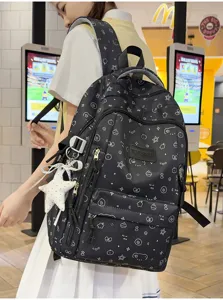 Zwarte rugzak met sterrenprint en beer, casual schooltas met een leuke sterrenhanger.