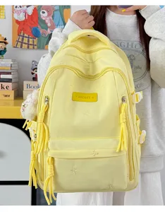 Leuke gele schoolrugzak voor meisjes, grote casual dagrugzak met mooie geborduurde strikdetails.