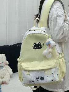 Leuke ster kat patroon canvas schoolrugzak met pluche hanger voor studenten dagelijks gebruik.