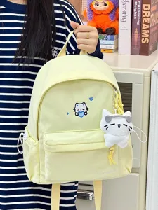 Schattige canvas schoolrugzak met kattenborduurwerk en pluche hanger voor dagelijks gebruik.
