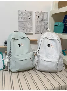 Casual minimalistische canvas schoolrugzak voor studenten met schattige kattenborduurwerk.