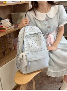 Schattige Koreaanse stijl rugzak voor meisjes met blauwe strikprint en grote capaciteit schoolas.