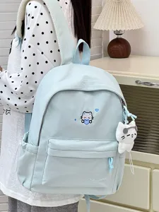 Lichtblauwe studenten rugzak met schattig katten borduurwerk en pluche hanger voor dagelijks gebruik.