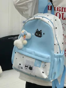 Schattig kattenpatroon studenten rugzak detailweergave, lichtblauwe canvas schooltas.