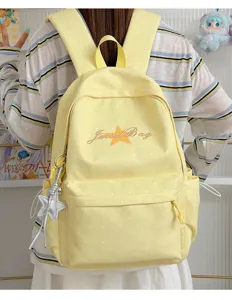 Leuke gele stippen rugzak met sterontwerp, lichte schooltas voor tieners en studenten.