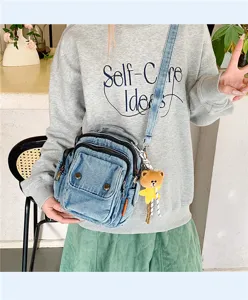 Casual denim cross body bag with multiple pockets and cute bear pendant for women