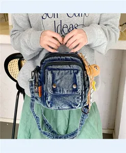Casual denim crossbody bag for women, vintage washed shoulder bag with pockets and bear.