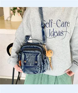 Casual denim shoulder bag with multi pockets and cute bear pendant for daily women use