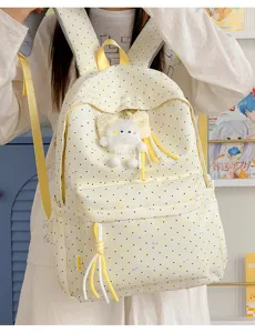 Gele polkadot canvas rugzak voor dames, schattige pluche hanger en studentenschooltas.