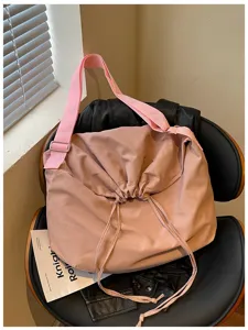 Sac bandoulière unicolore décontracté à cordon de serrage grande capacité style mode quotidien.
